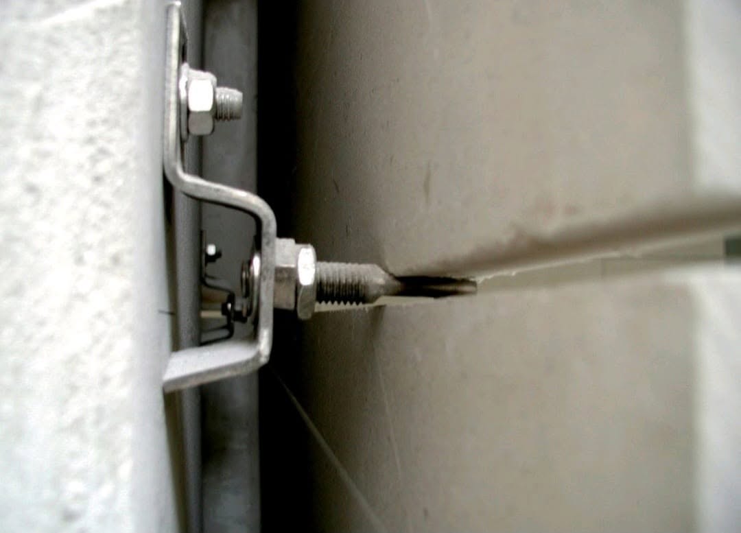 Revêtements muraux attachés en pierre mince (DTU 55.2)